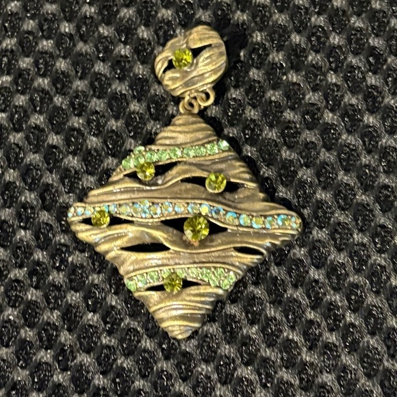 Wavy Textured Gold-Tone Pendant with
Sparkling Green Gems - Picture 4 of 9